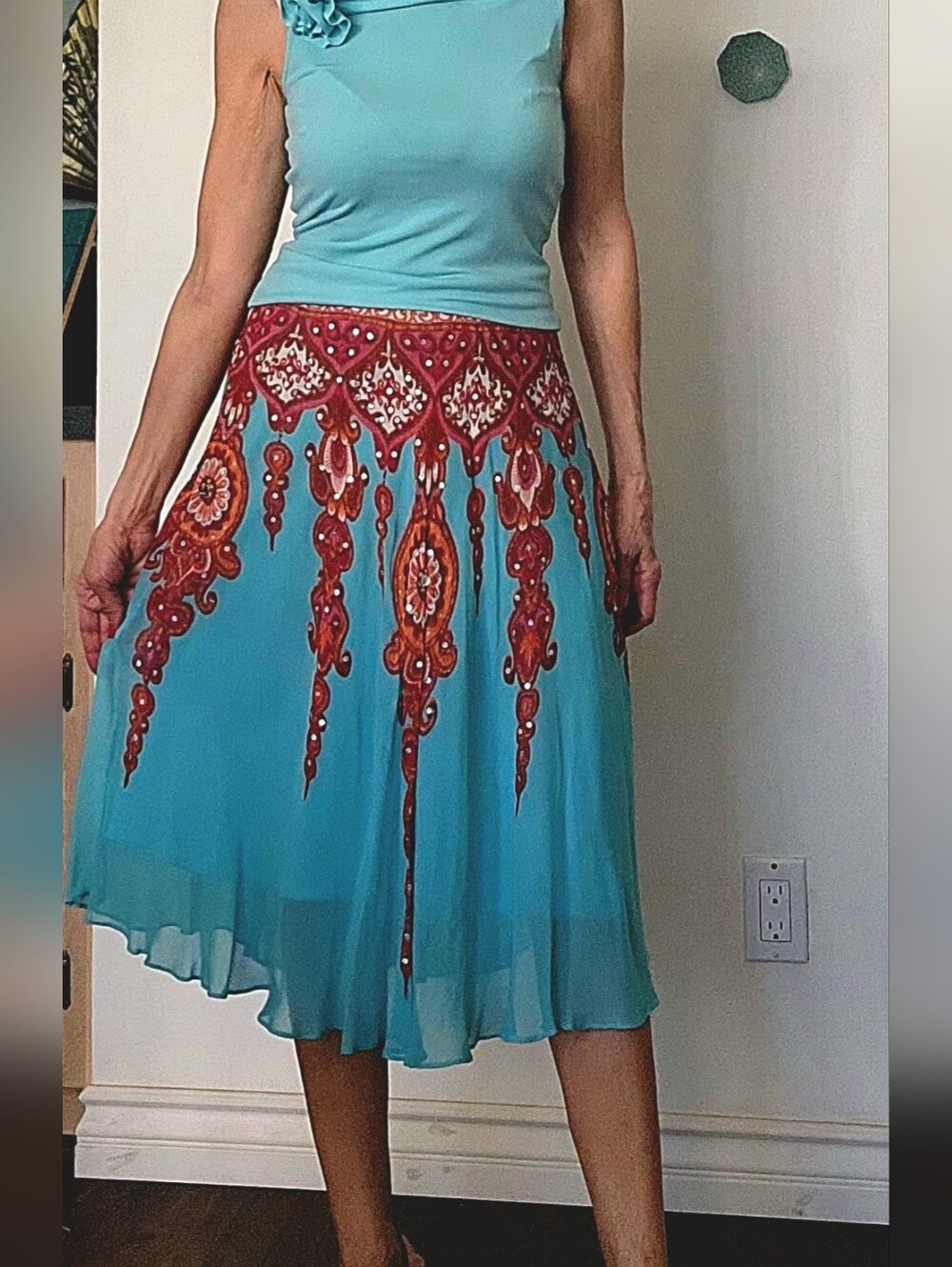 Turquoise Printed Midi Skirt with Red Orange Ornamental Border.